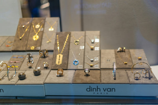 Dinh van paris jewelry display with necklaces and rings